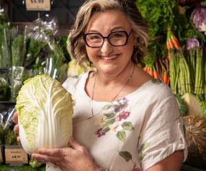 julie goodwin holding a wombok